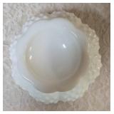 Vintage Fenton hobnail milk glass set features a lidded compote or candy dish and a matching smaller bowl .  The smaller bowl is 2 1/2" Tall.  Popular throughout the mid-20th century.