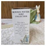 Beatrix Potter Items:  Beatrix Potter writeup from newspaper, Bar of Soap, Notecards, Candy or flower pot Peter Rabbit Bowl.