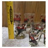 11 -Glasses - Misc., sizes.  Glassware is likely produced by the Hazel-Atlas Glass Company and  features the "Pheasants" pattern, produced roughly 1950