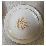 Complete -Place setting for fifteen, dinner plate,  salad plate, soup bowl, coffee plate. Set of "Homer Laughlin Golden Wheat" dinnerware, featuring 22k gold trim and a wheat stalk pattern.