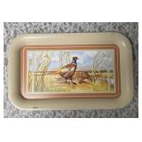 Seven vintage TV dinner trays or snack trays, likely manufactured in the 1950