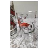 One Vintage Mid Century Glass Cocktail Shaker Drink Mixer without shaker top and 6 Misc. Glasses set featuring the Pheasant Birds from the likely produced by Hazel-Atlas Glass Company.