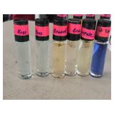 Lot of (6) Roll-On Perfumes - R. Kiss (x2), R. Crush (x2), Eat It Raw (x1), Issy Miyake (x1)