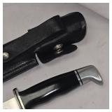 Buck 119 USA w/Black Leather Sheath