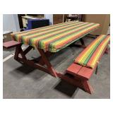 Outdoor Picnic Table with Benches and Striped Cushions
