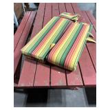 Outdoor Picnic Table with Benches and Striped Cushions