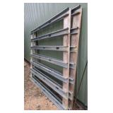 C-channel rails nailed to wood 2x4's