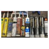 Caulk and caulk guns