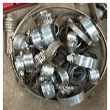 Bin w/hose clamps, 21-piece drum sanding kit, nuts, bolts, screws, etc…