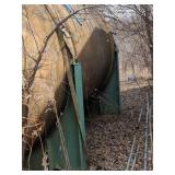 Fiberlgass chemical storage tank. Approx 20'x
