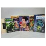 Assorted VHS movies including Disney titles Snow White, Bambi, Monsters Inc, and Hercules along with Hulk. Mixed family and animated films in standard VHS cases shown.