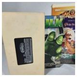 Assorted VHS movies including Disney titles Snow White, Bambi, Monsters Inc, and Hercules along with Hulk. Mixed family and animated films in standard VHS cases shown.