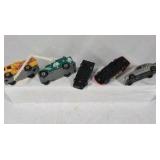 Mixed die cast cars including race cars, police vehicles, trucks, and dragsters. Various colors, styles, and themes with Hot Wheels and Matchbox type models.
