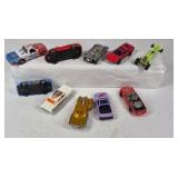Mixed die cast cars including race cars, police vehicles, trucks, and dragsters. Various colors, styles, and themes with Hot Wheels and Matchbox type models.