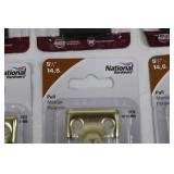 National Hardware Cabinet Pulls 5-3/4 in Black & 6-1/2 in Brass (Lot of 8)