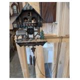 Black Forest Chalet Cuckoo Clock with Moving Balcony Figures & Pinecone Weights