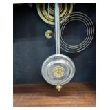 Antique Carved Oak Mantel Clock with Brass Dial and Pendulum