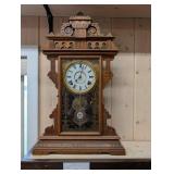 Welch 1885 Carved Wood Mantel Clock with Glass Panel and Pendulum