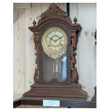 Gilbert Manitoba 1879 Late 19th Century Ansonia Carved Walnut Mantle Clock, with two-train movement, paper & brass dial & stencilled glass panel door