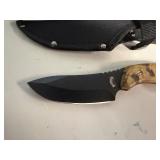 The Whistler Hunting Knife Black Coated Stainless Steel Blade, Pakka Wood Handle with Camo Coating 9' Overall
