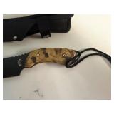 The Whistler Hunting Knife Black Coated Stainless Steel Blade, Pakka Wood Handle with Camo Coating 9' Overall