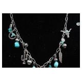 Silver Tone Charm Necklace with Turquoise Stones