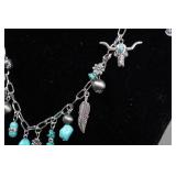 Silver Tone Charm Necklace with Turquoise Stones