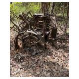 LARGE cast iron farming equipment.