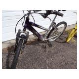 18 Speed bike and Yellow Tricycle