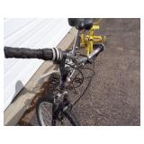 18 Speed bike and Yellow Tricycle