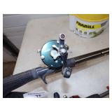 4 Rods and Reels and Minnow Bucket