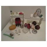 White stands and trinkets...