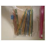 Crochet needles, thread and coaster...