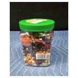 Jar of jewelry and jewelry pieces