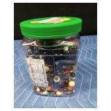 Jar of jewelry and jewelry pieces