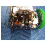 Jar of jewelry and jewelry pieces