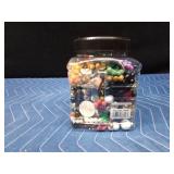 Jar of jewelry and jewelry pieces