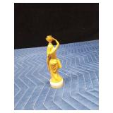 1920's or 1930's Celluloid lady carrying water on a marble base