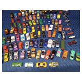 Over 100 toy cars, motorcycles, trucks and more