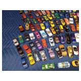 Over 100 toy cars, motorcycles, trucks and more