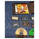 8 DS game cartridges and 2 Nintendo Game boy discs and 1 empty case