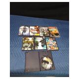 Play Station 2 games, 4 empty cases and 1 game in the wrong case