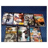 Play Station 2 games, 4 empty cases and 1 game in the wrong case