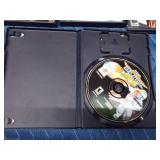 Play Station 2 games, 4 empty cases and 1 game in the wrong case