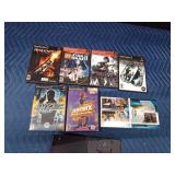 4 Play Station 2 games (1 in wrong case) and 4 empty cases