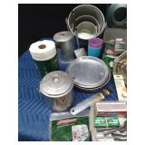 Camp cooking supplies including a small Colemans propane stove