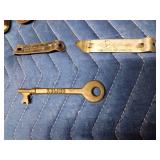 Vintage items including Marlboro lighter and Grain Belt bottle opener