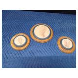 3 Blue Moon pottery bun warmers with indentations of plants