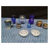 Blue glassware and 2 candlestick holders