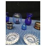 Blue glassware and 2 candlestick holders